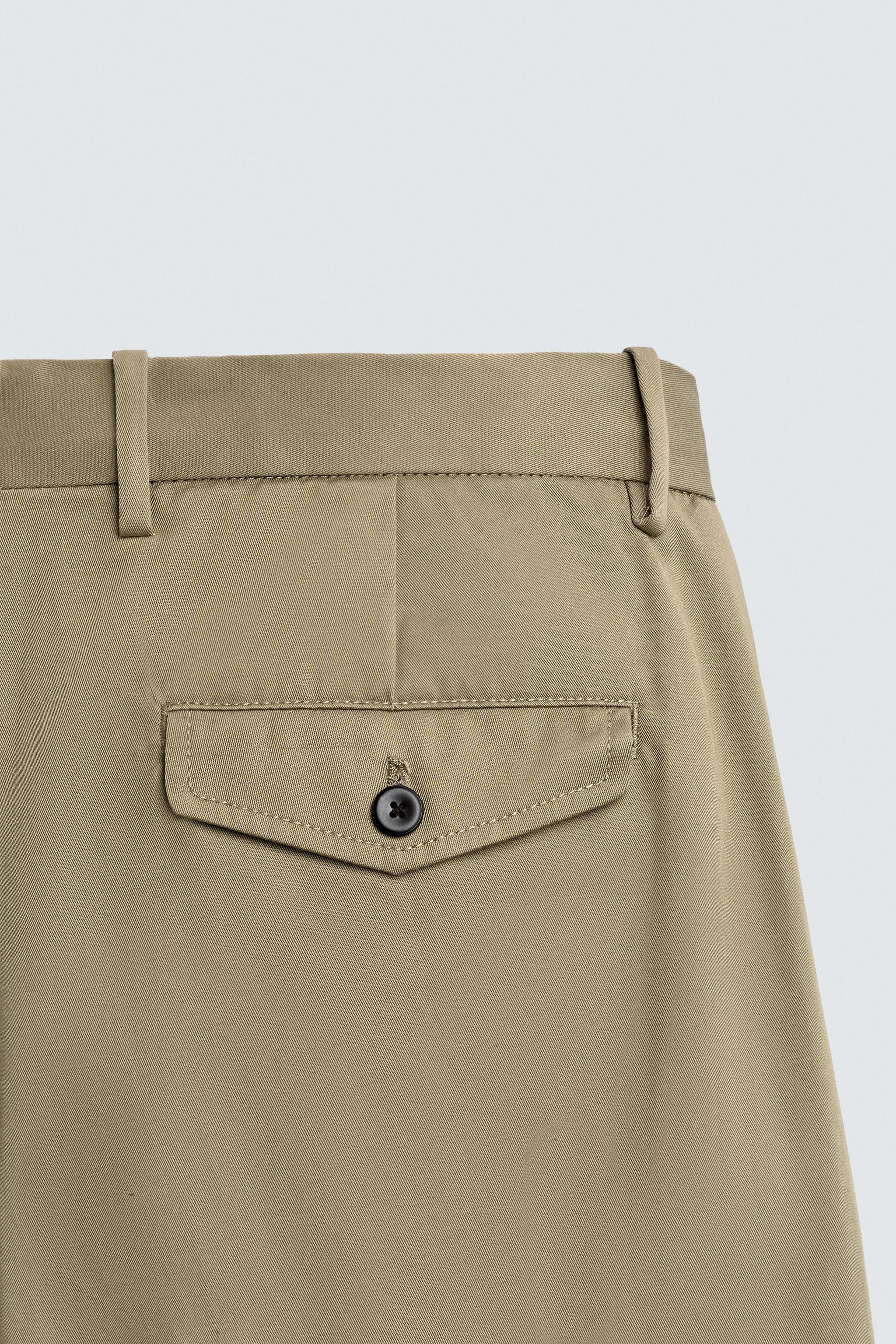 PLEATED WIDE FIT PANTS
